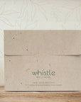 Whistle Wellness XL disposable face towel and packaging