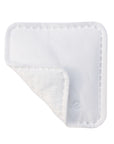 Close-up of the layered construction of a Whistle cotton face pad