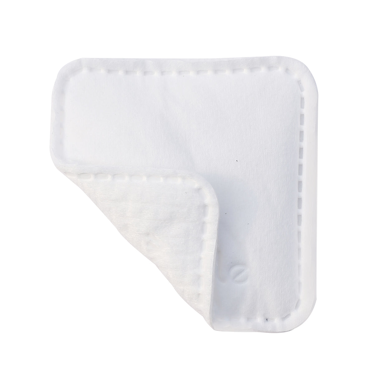 Close-up of the layered construction of a Whistle cotton face pad