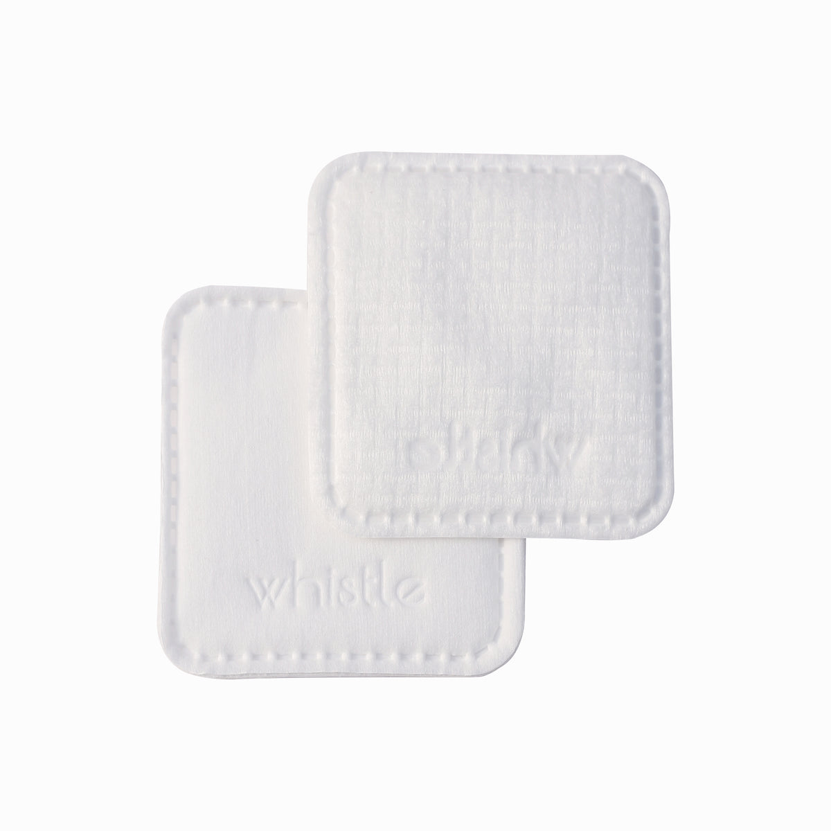 Two square Whistle cotton face pads showing textured and smooth surfaces